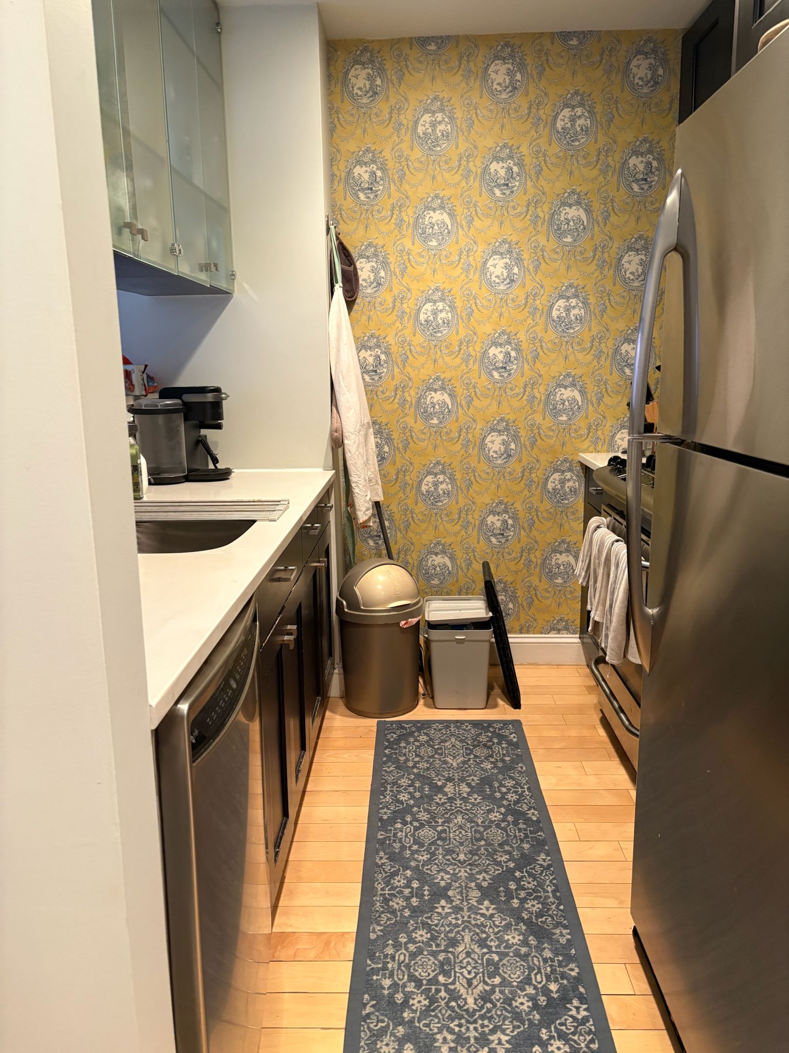 249 East 118th Street, Unit 3A Manhattan, NY 10035 - Photo 6 of 16 a kitchen with a sink appliances and cabinets