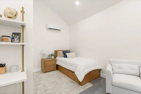 a kitchen with stainless steel appliances a refrigerator sink and cabinets