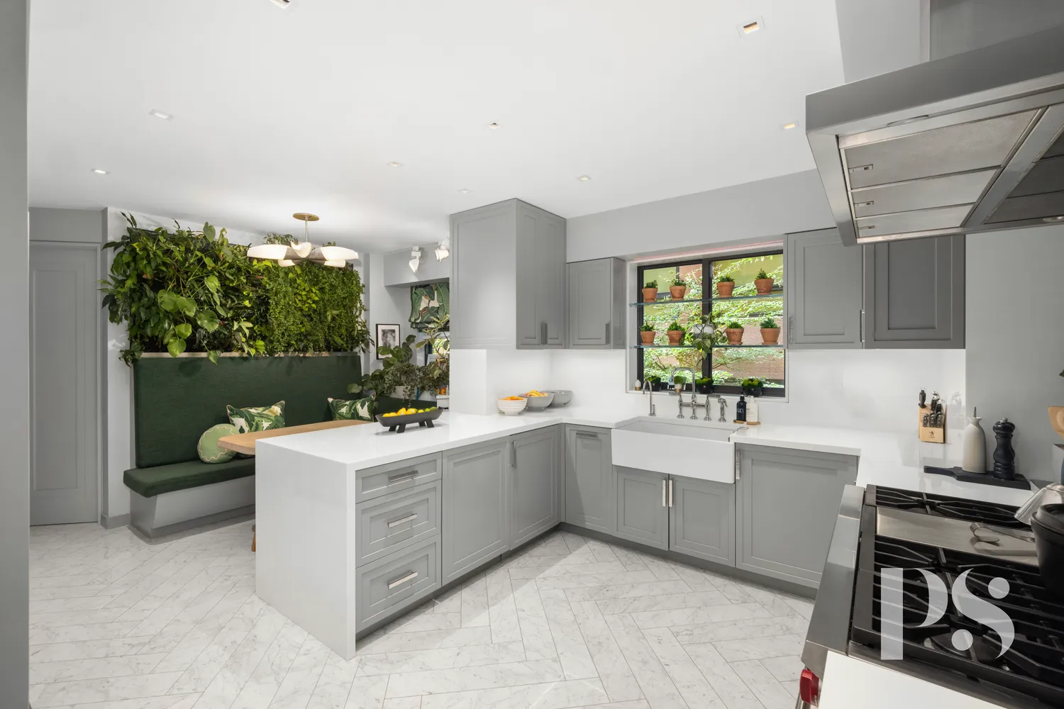 a kitchen with a sink stove and cabinets