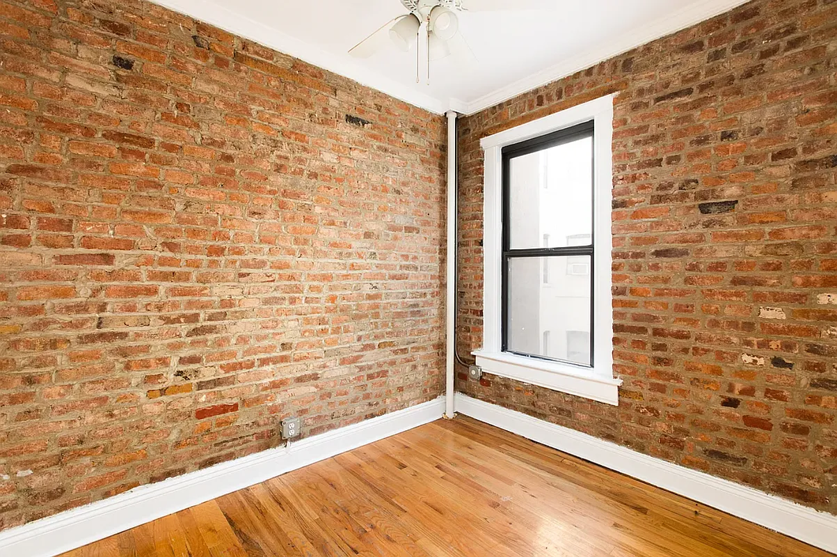 649 East 9th Street, Unit D3 Manhattan, NY 10009 - Photo 2 of 5 a bathroom with a window
