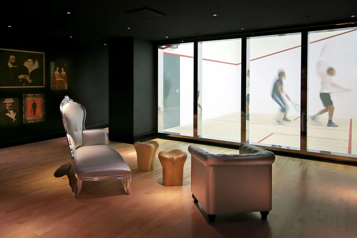 a living room with furniture and floor to ceiling window