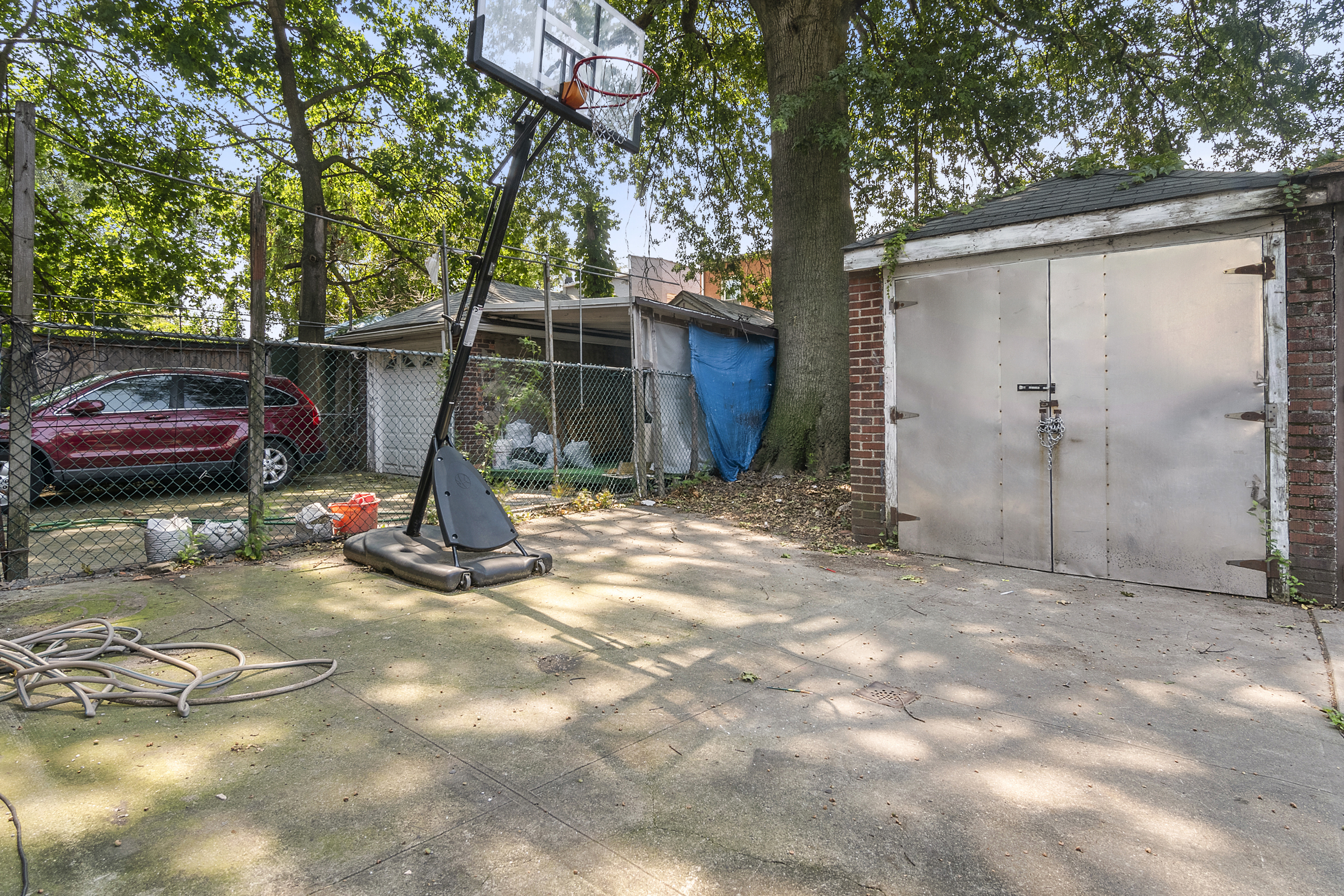 266 East 43rd Street Brooklyn, NY 11203 - Photo 10 of 11 a view of a backyard with a tree