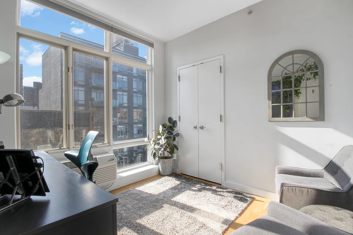 342 East 110th Street, Unit 5E Manhattan, NY 10029 - Photo 6 of 18 a living room with furniture