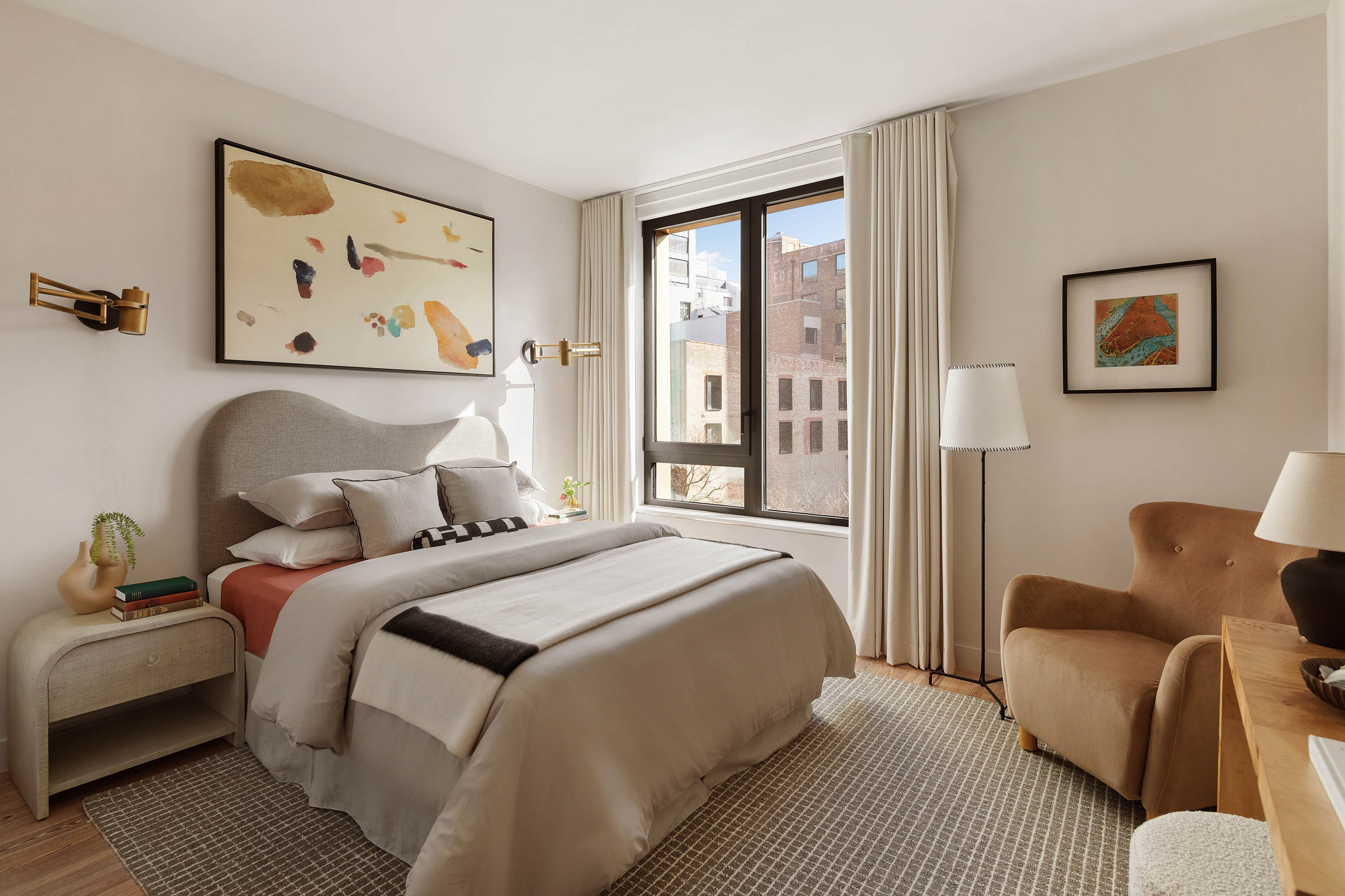 90 Furman Street, Unit N411 Brooklyn, NY 11201 - Photo 16 of 29 a bedroom with bed couch and window