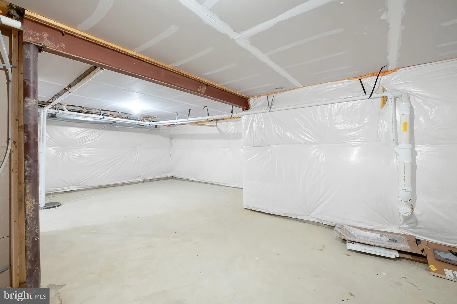 a view of a field with an ocean