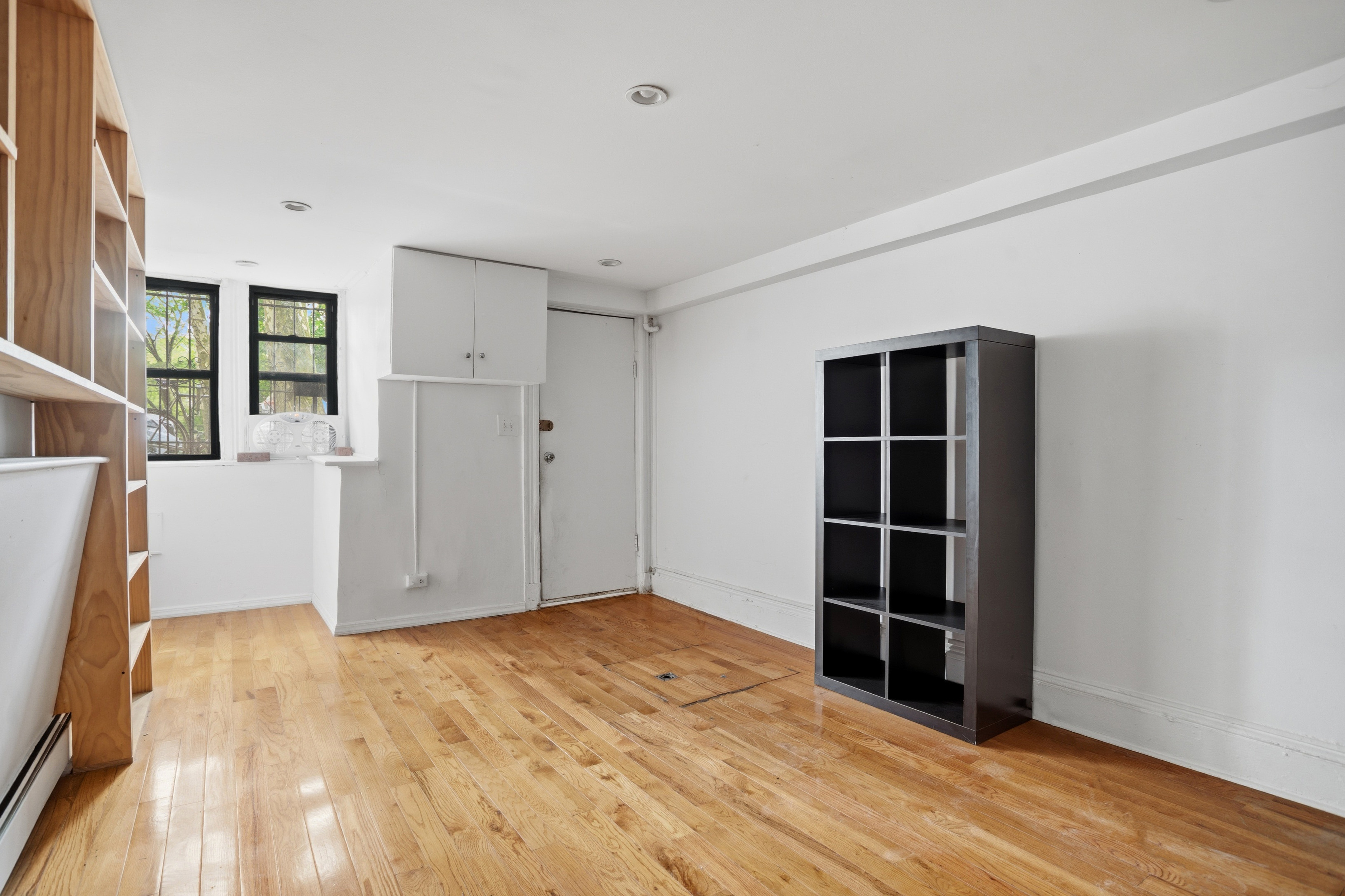 417 A 18th Street Brooklyn, NY 11215 - Photo 10 of 16 a view of empty room with wooden floor and closet
