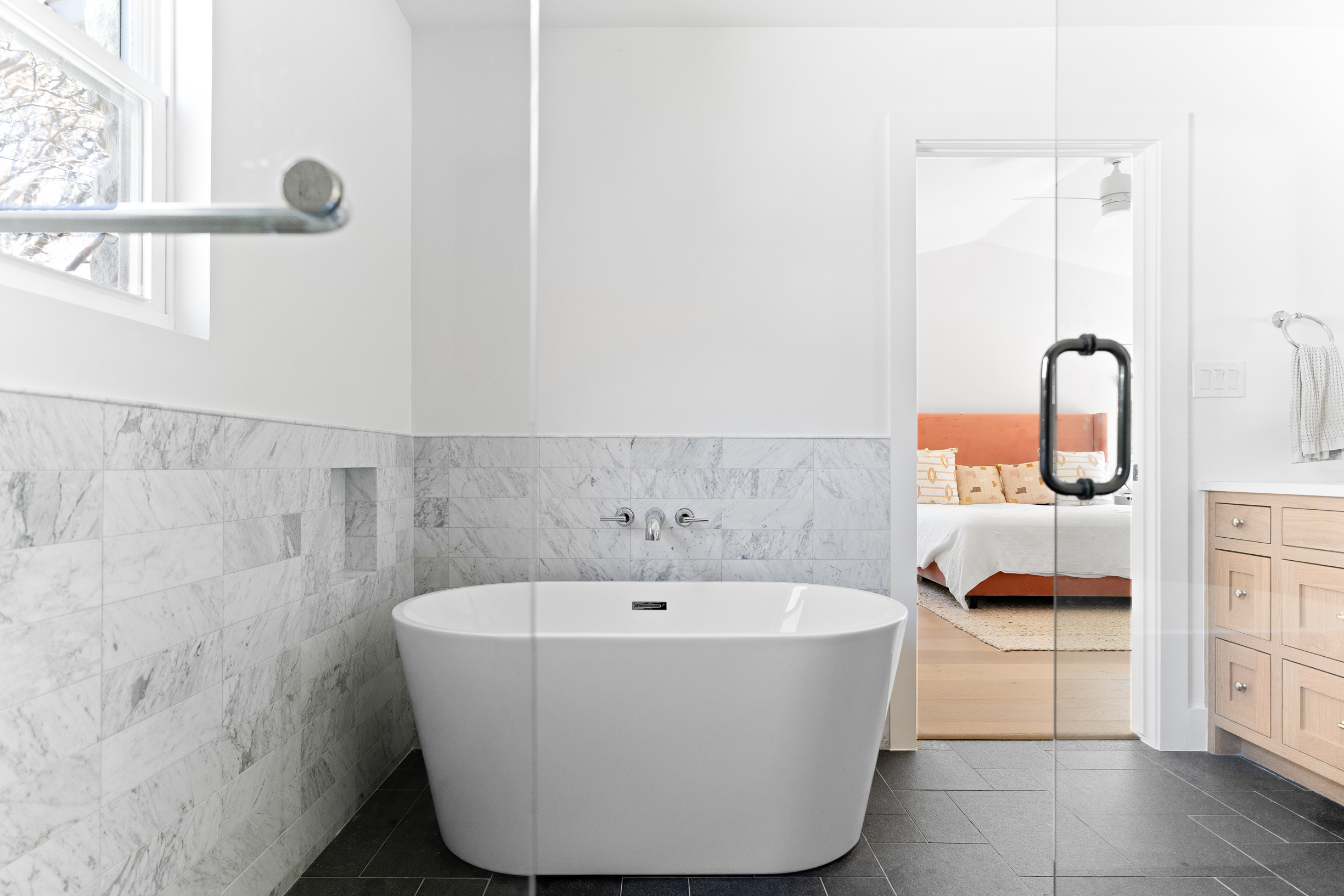 1317 Thaddeus Cove Austin, TX 78746 - Photo 13 of 22 a white bath tub sitting in a bathroom