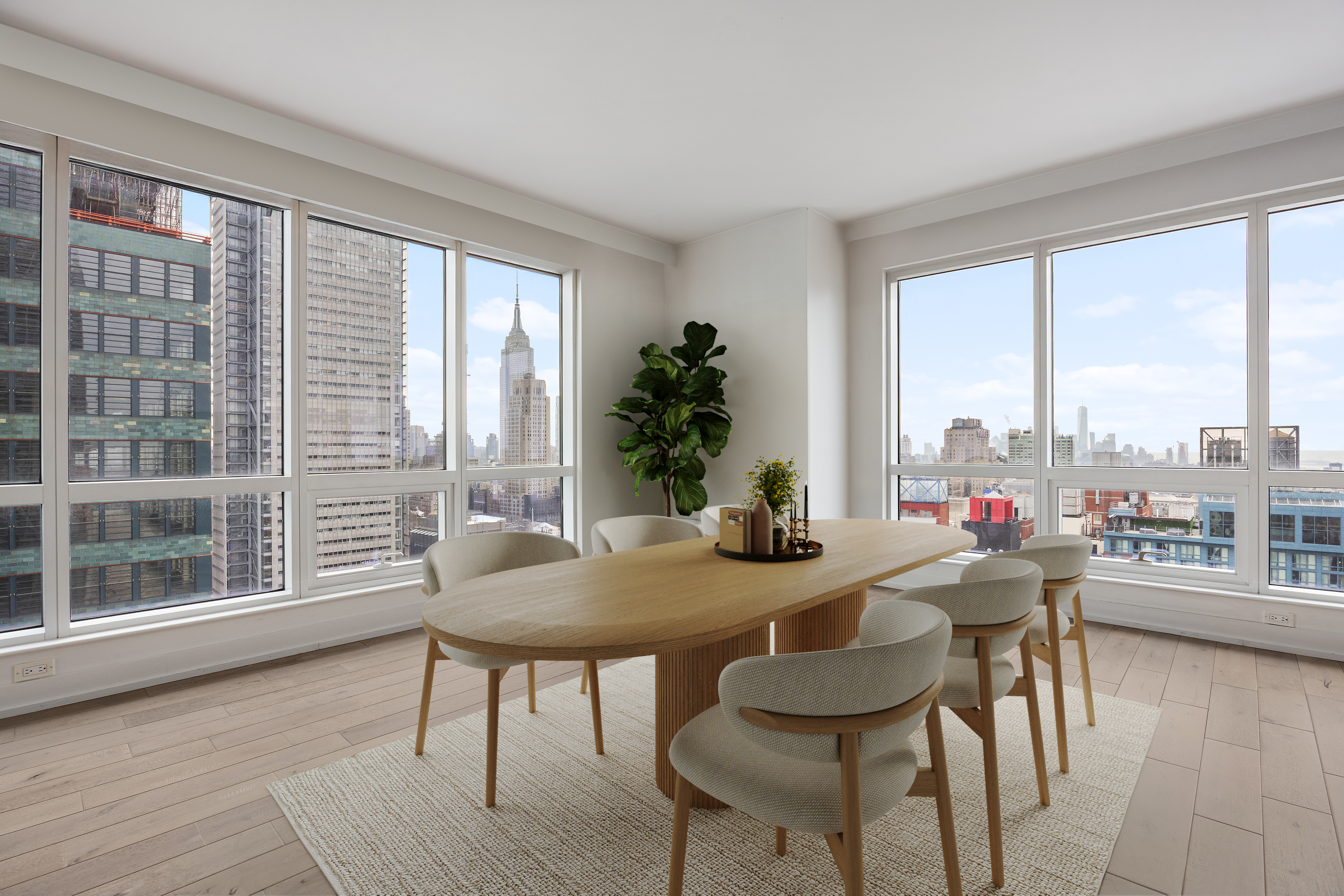 350 West 42nd Street, Unit 37G Manhattan, NY 10036 - Photo 6 of 14 a view of a dining room with furniture and wooden floor