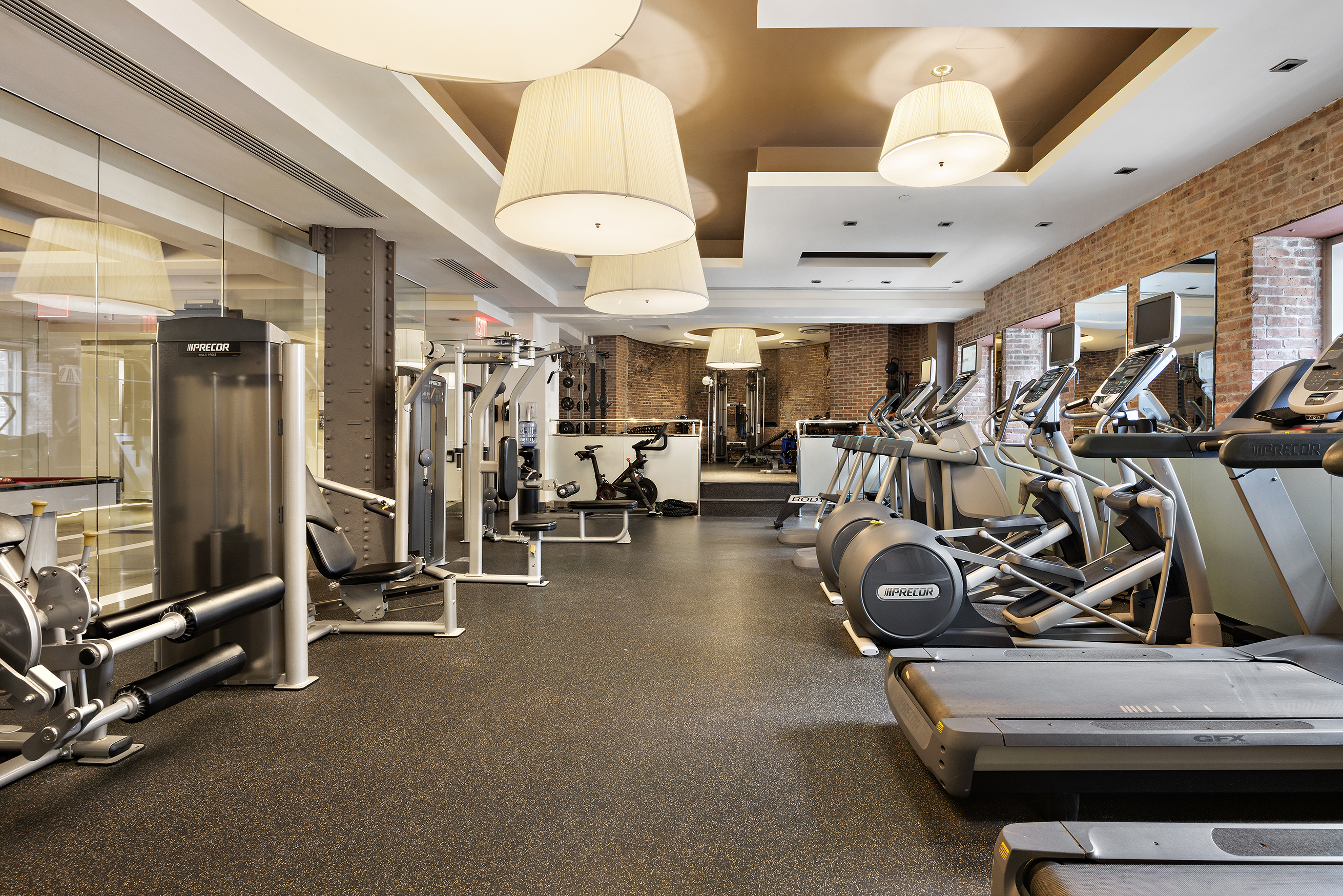 2-17 51st Avenue, Unit 913 Queens, NY 11101 - Photo 13 of 17 a view of a room with gym equipment