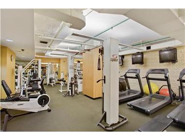 169 East 69th Street, Unit 7/8 B Manhattan, NY 10021 - Photo 20 of 30 a view of a room with gym equipment