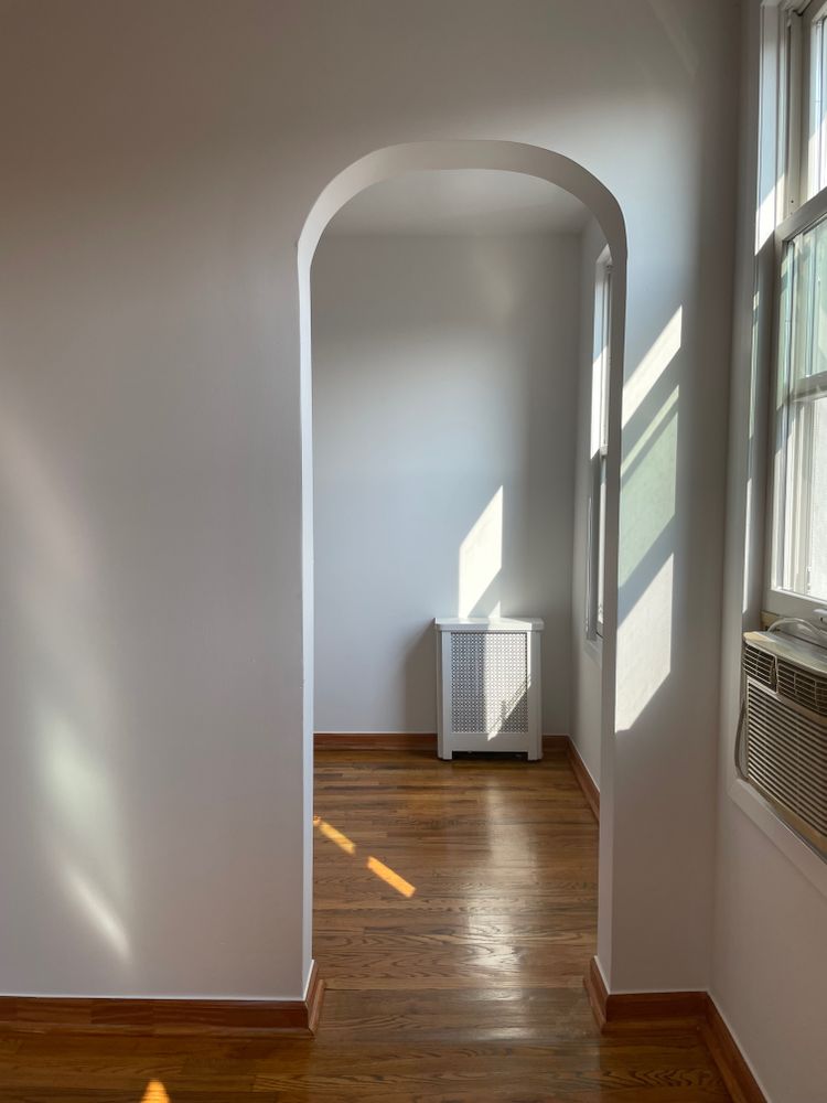 250 19th Street, Unit 3A Brooklyn, NY 11215 - Photo 13 of 15 a view of a living hall with wooden floor and a window