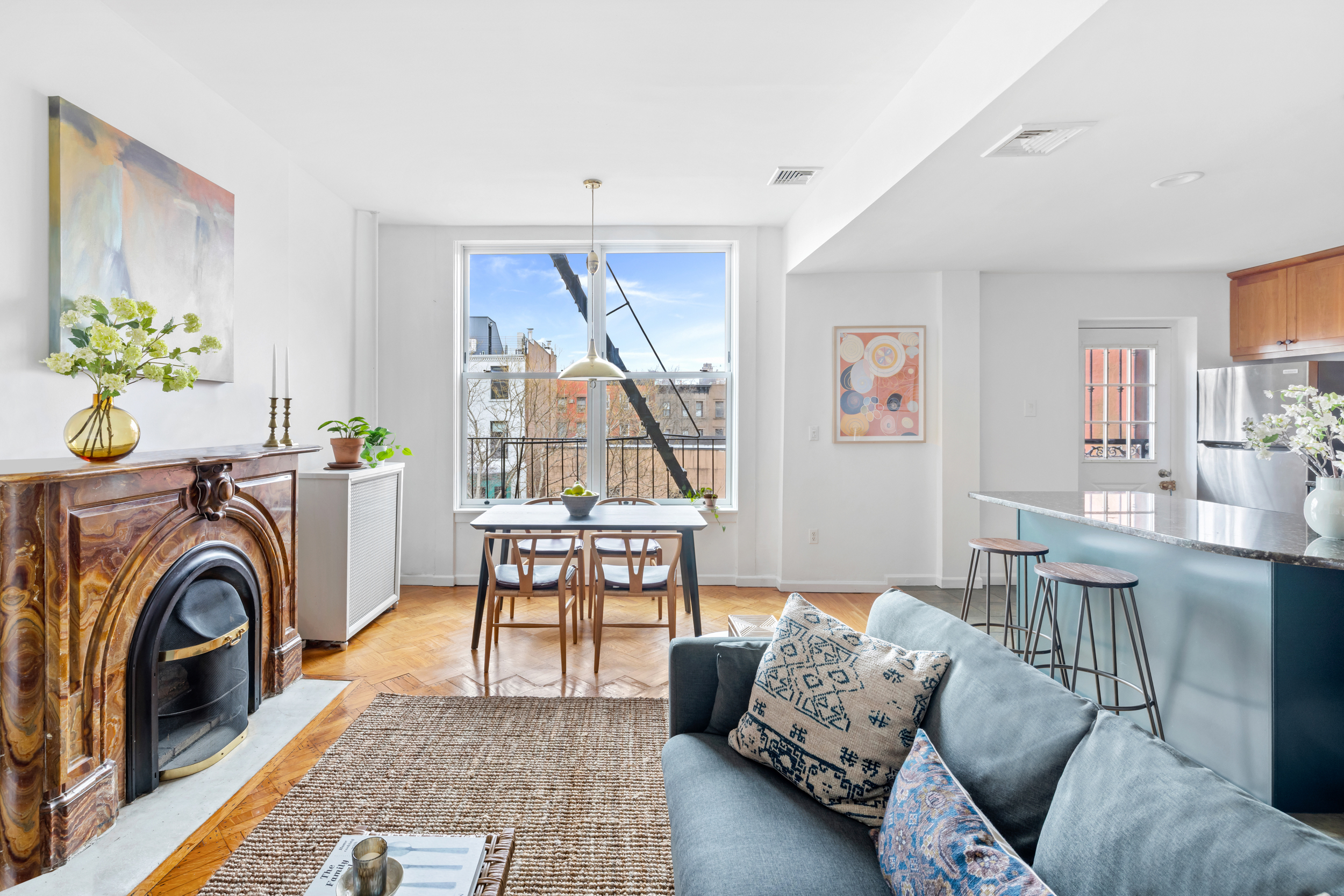 a living room with furniture and a table