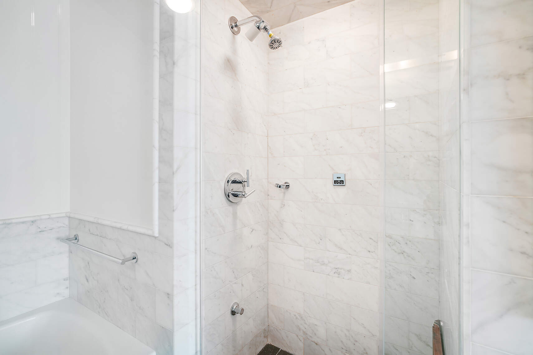 454 West 54th Street, Unit 3A Manhattan, NY 10019 - Photo 11 of 13 a bathroom with a shower