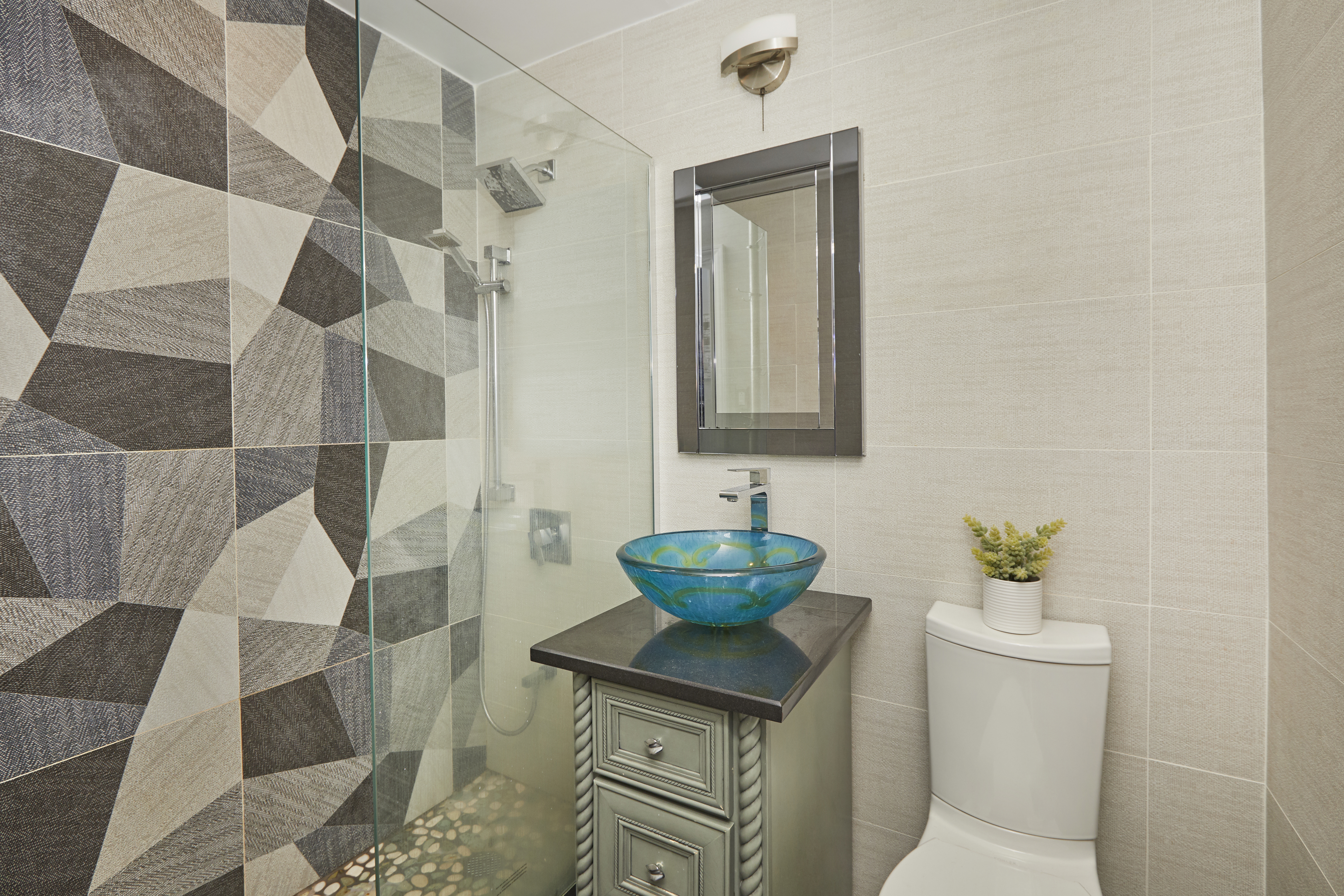 443 Hicks Street, Unit 3E Brooklyn, NY 11201 - Photo 5 of 7 a bathroom with a sink toilet and shower