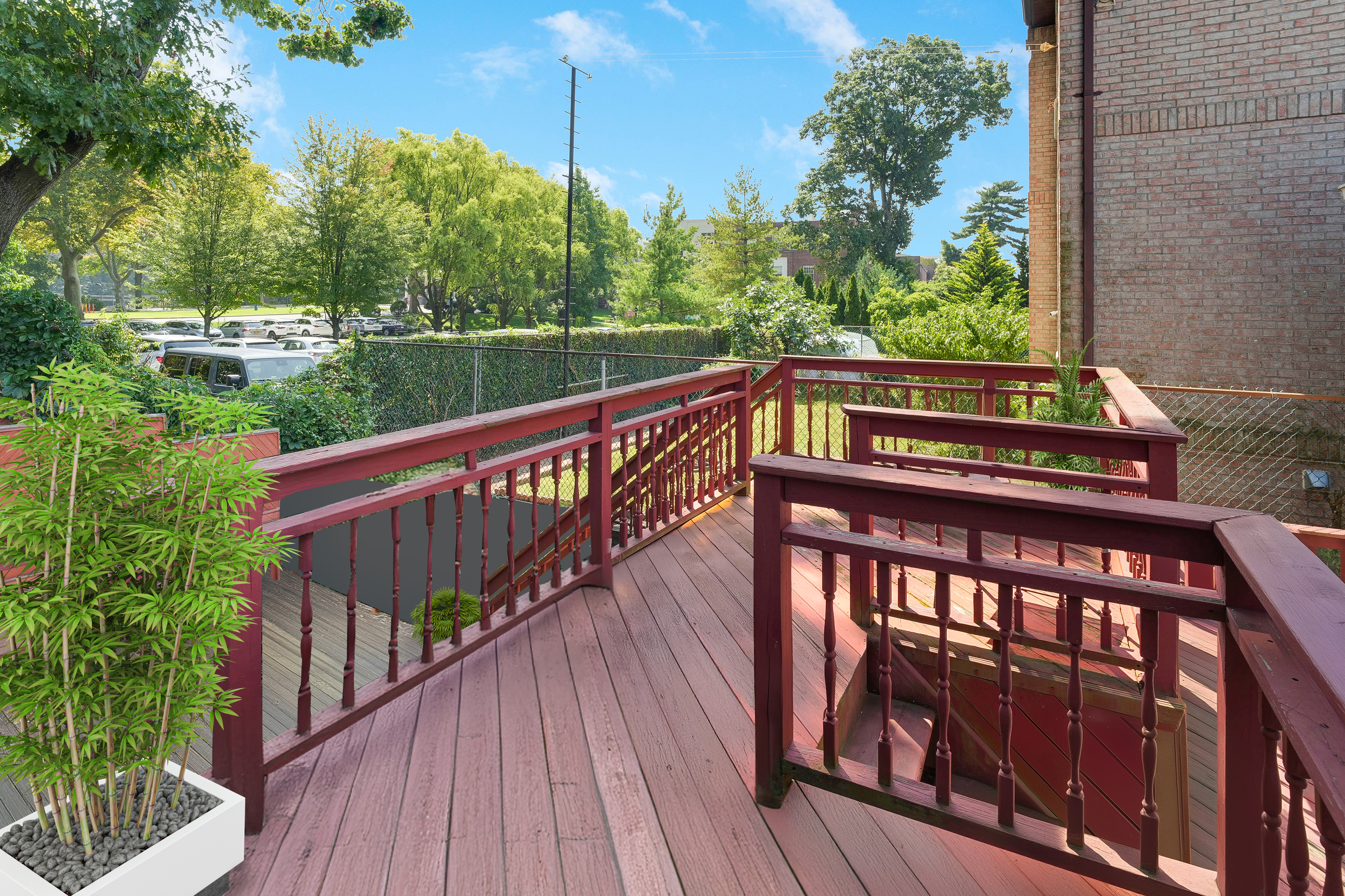 233 Battery Avenue Brooklyn, NY 11209 - Photo 12 of 17 a view of a wooden deck with a yard