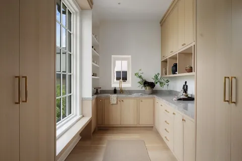 a bed room with a bed and a potted plant