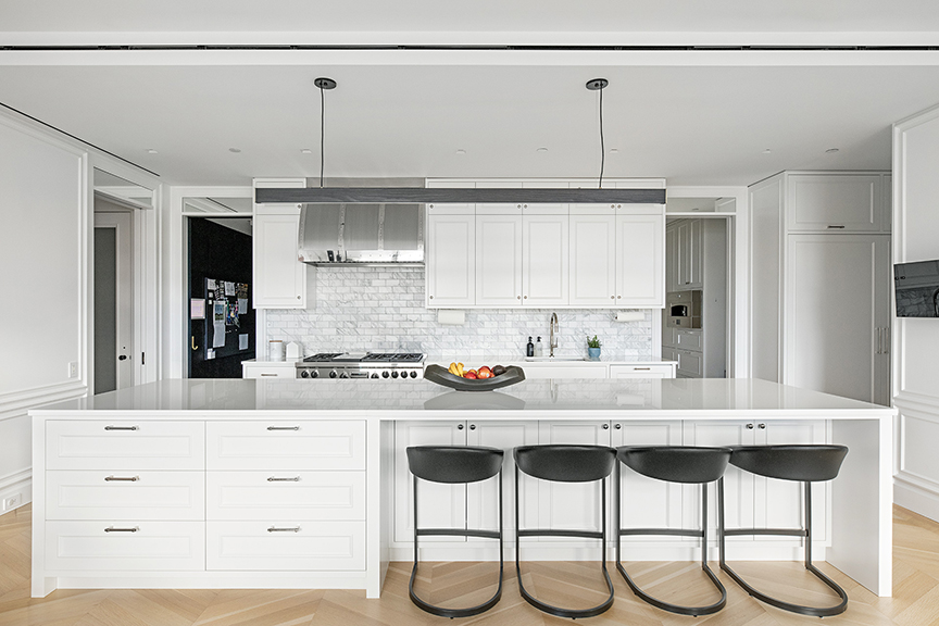 92 Laight Street, Unit 3ABC Manhattan, NY 10013 - Photo 10 of 26 a kitchen with stainless steel appliances kitchen island granite countertop a table and chairs in it