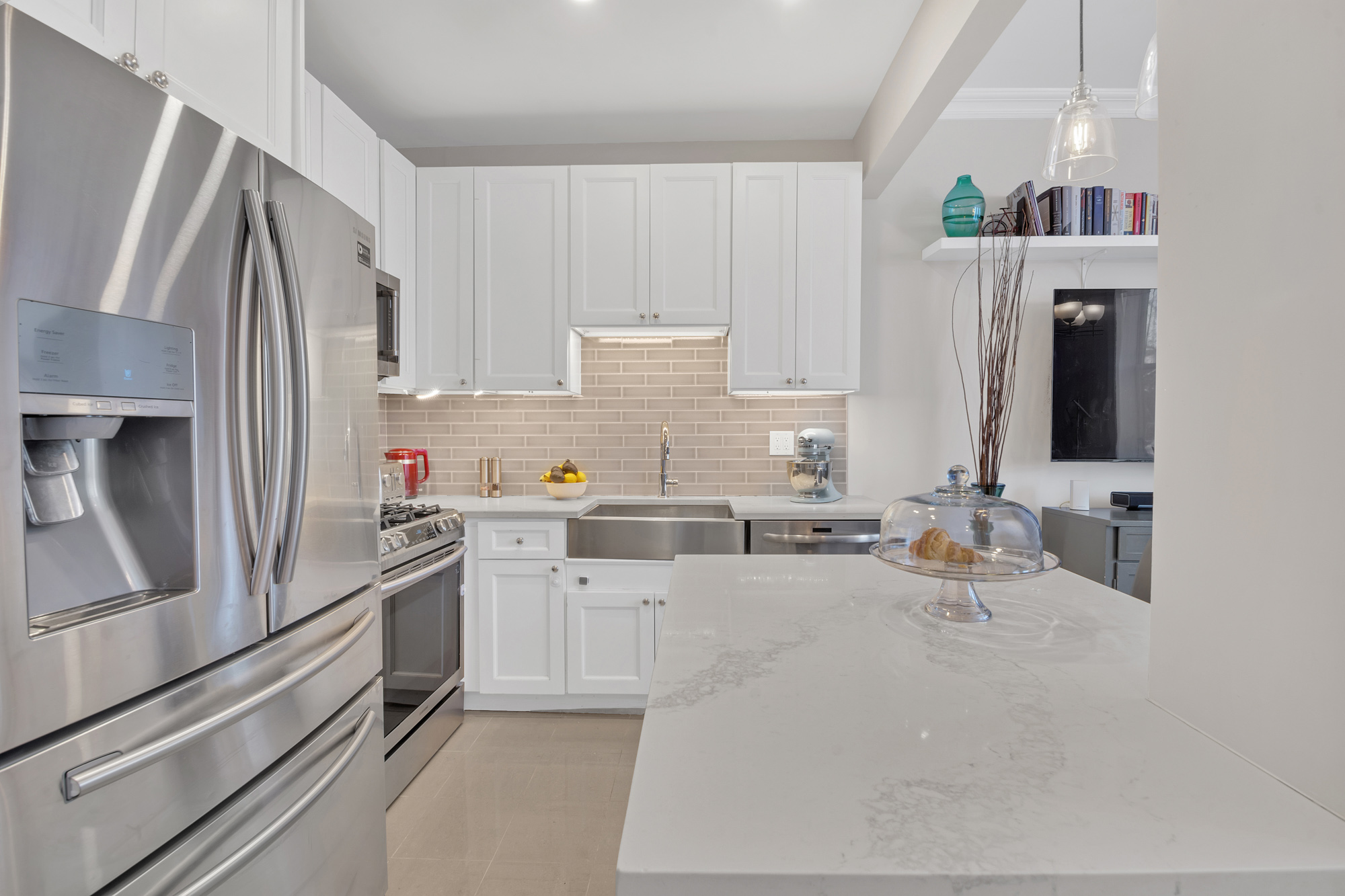 8 Mt Morris Park West, Unit C Manhattan, NY 10027 - Photo 4 of 12 a kitchen with granite countertop a refrigerator stove and sink