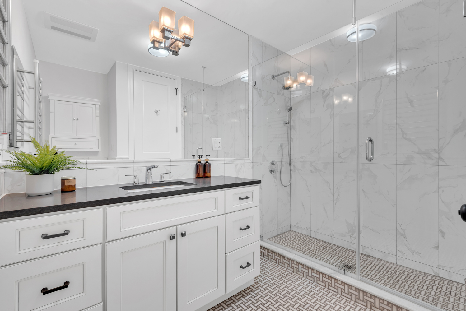 94 Lefferts Place, Unit 2 Brooklyn, NY 11238 - Photo 6 of 10 a bathroom with a double vanity sink a large mirror and shower