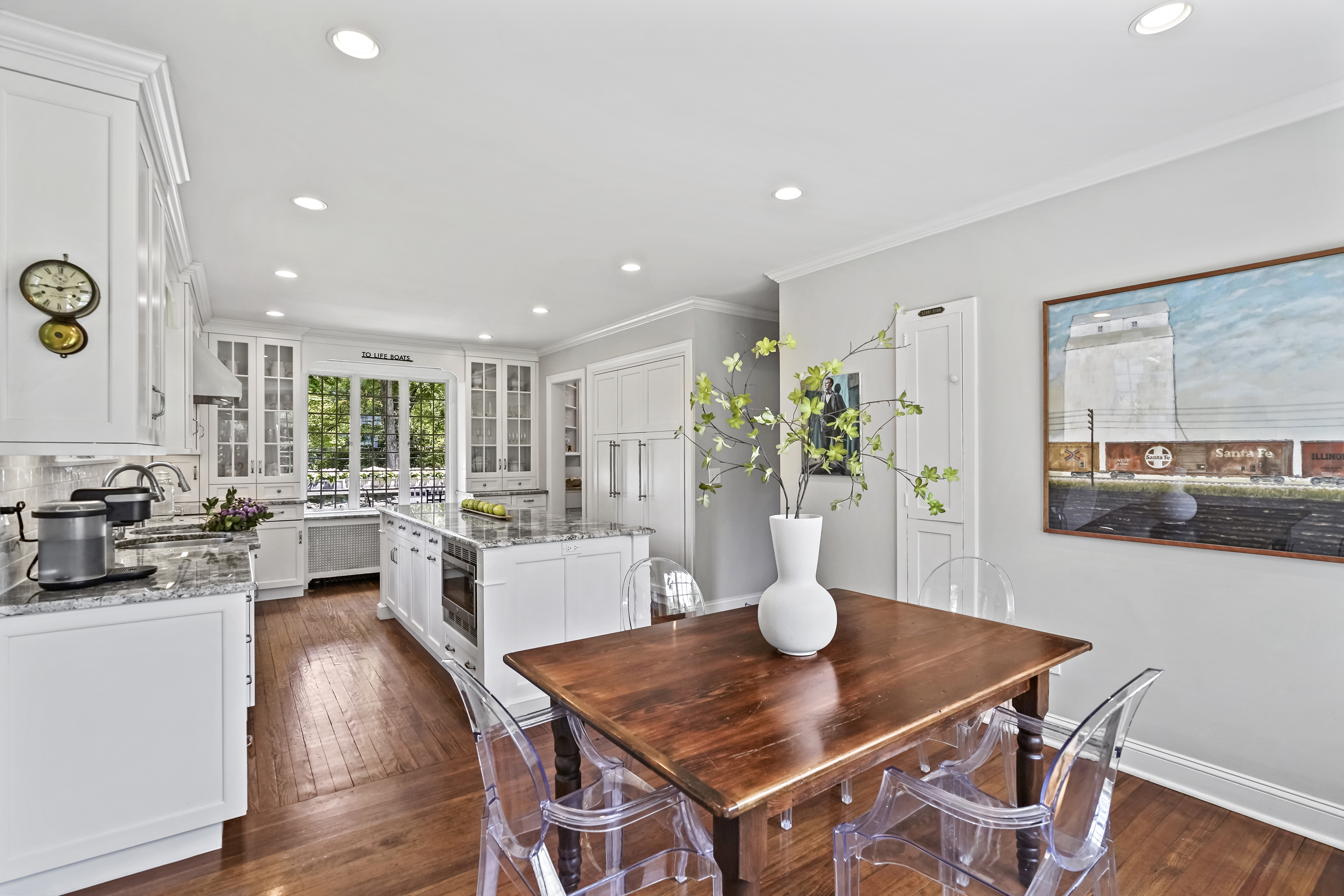 19 Avon Road Larchmont, NY 10538 - Photo 7 of 35 a living room with dining table and wooden floor
