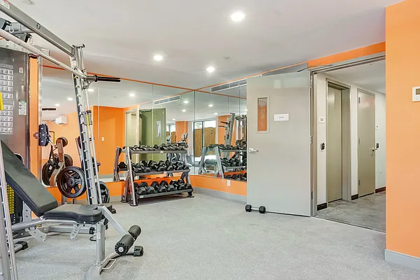605 Hart Street, Unit 406 Brooklyn, NY 11221 - Photo 7 of 10 a view of a room with gym equipment