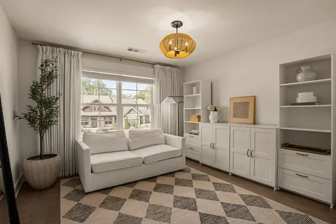 a living room with furniture and decor