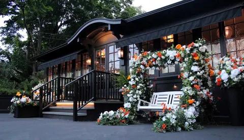 a view of a chairs and tables in the patio
