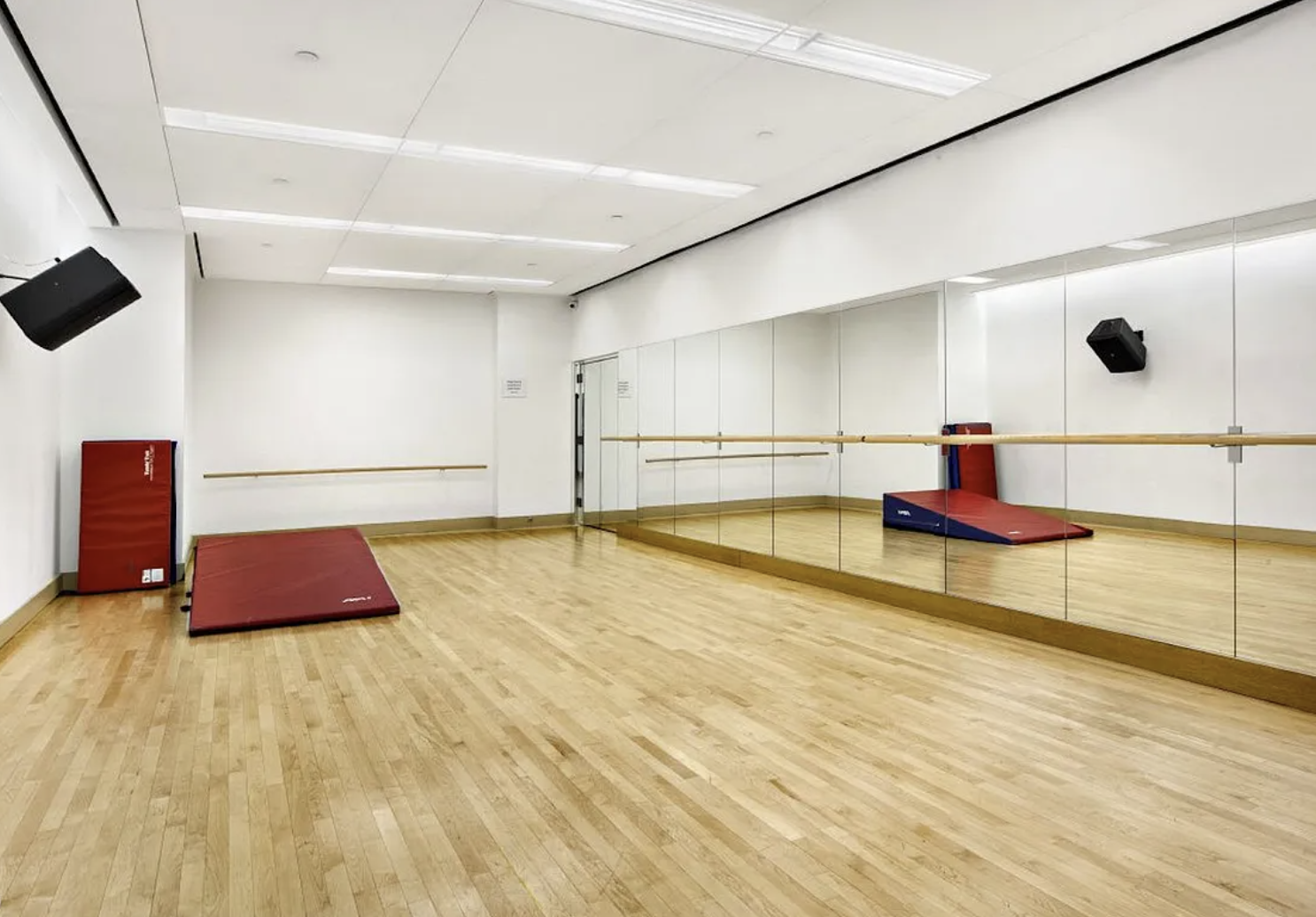 170 East End Avenue, Unit 7A Manhattan, NY 10128 - Photo 31 of 35 a bedroom with a bed and a large window