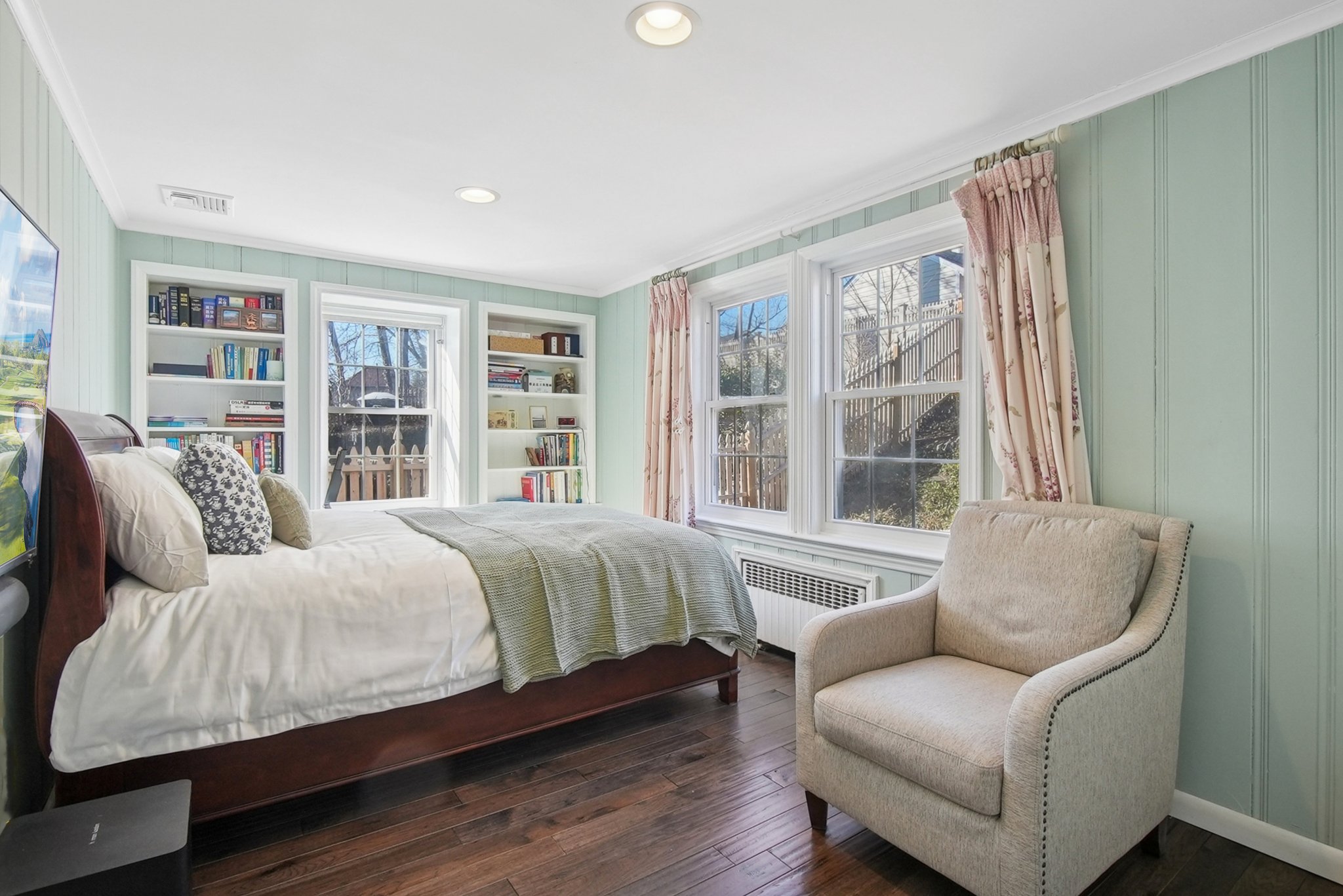 877 Ridgewood Road Millburn, NJ 07041 - Photo 16 of 37 a bedroom with a bed couch and a large window