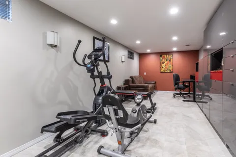 a view of a room with gym equipment