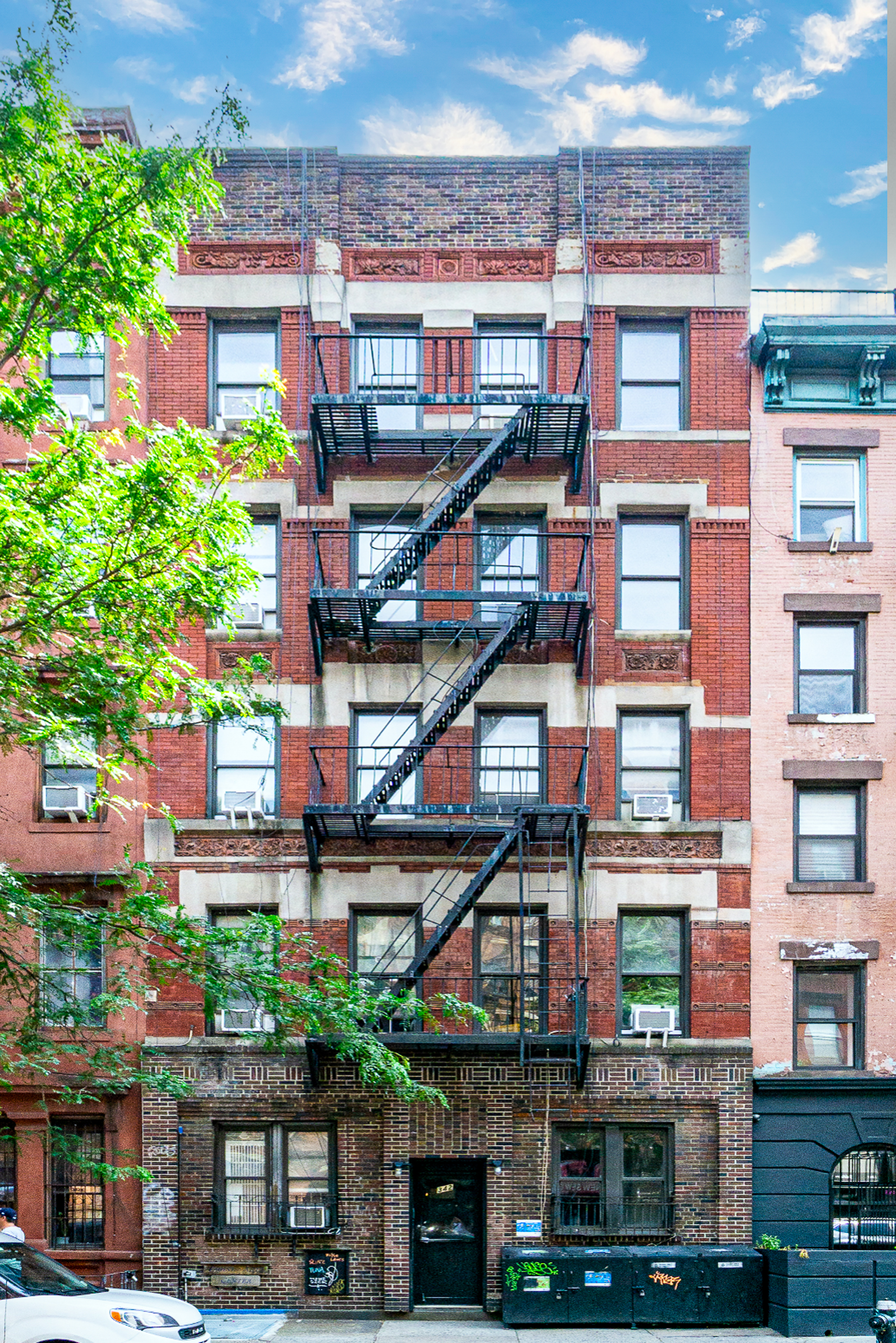 342 East 9th Street, Unit 3B Manhattan, NY 10003 - Photo 8 of 9 a bricked building with multiple windows