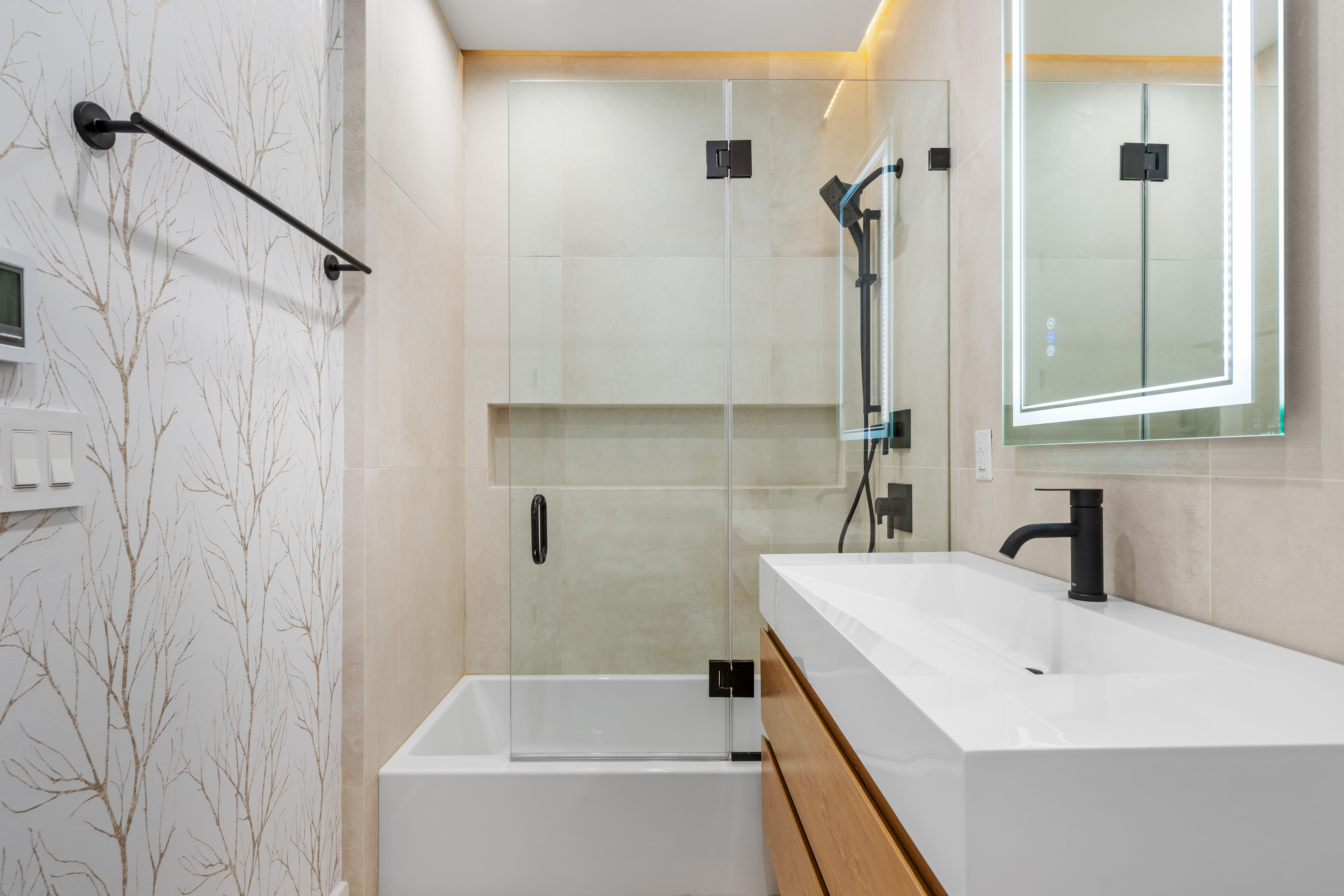 545 Lexington Avenue, Unit 2 Brooklyn, NY 11221 - Photo 10 of 23 a bathroom with a sink and a bathtub