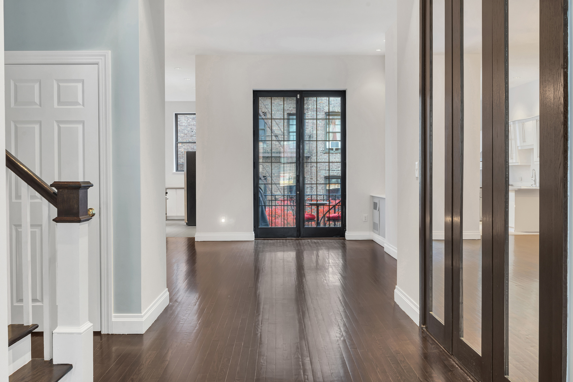 710 St Nicholas Avenue, Unit 2 Manhattan, NY 10031 - Photo 2 of 12 a view of an entryway with wooden floor