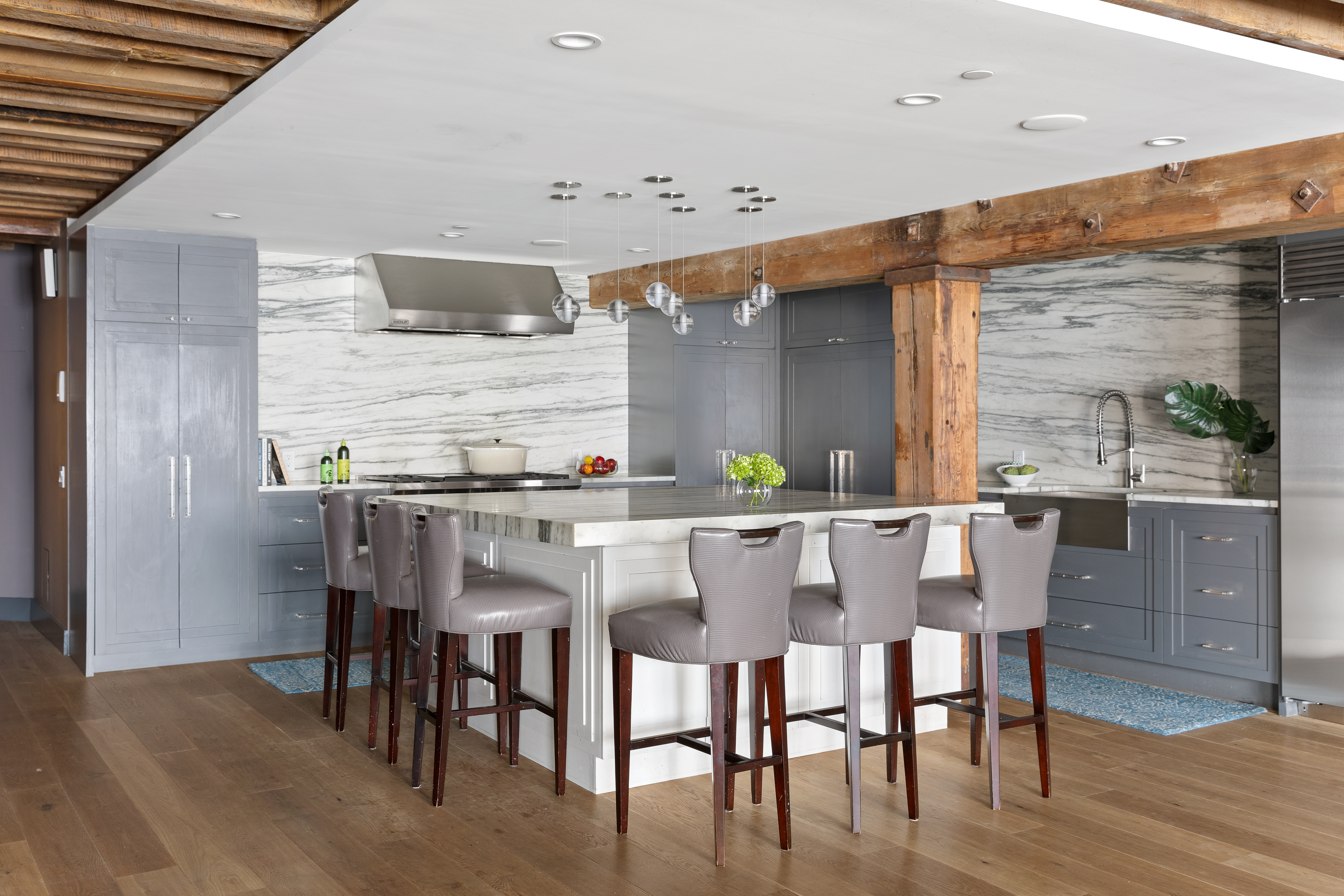 466 Washington Street, Unit 3W Manhattan, NY 10013 - Photo 4 of 14 a white kitchen with a table and chairs