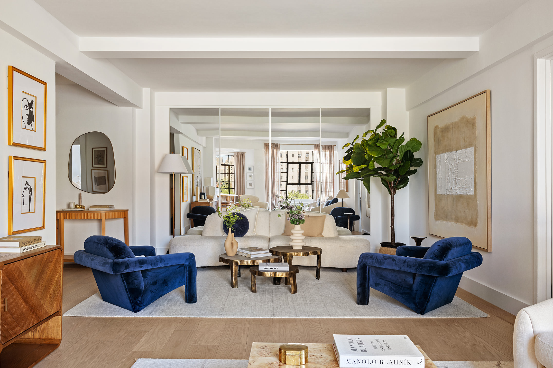 320 Central Park West, Unit 7L Manhattan, NY 10025 - Photo 3 of 16 a living room with furniture and potted plants