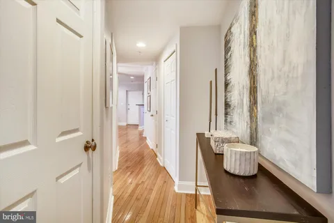 a view of a bathroom from the hallway