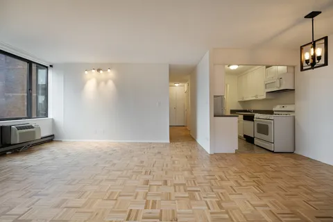 a view of a kitchen with a sink