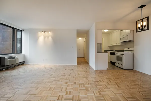 a view of a kitchen with a sink