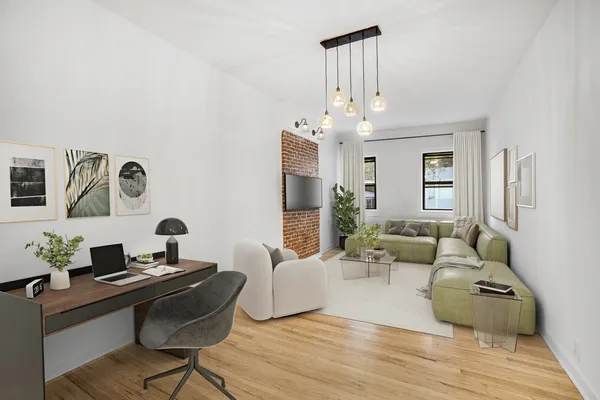 a living room with furniture and a chandelier