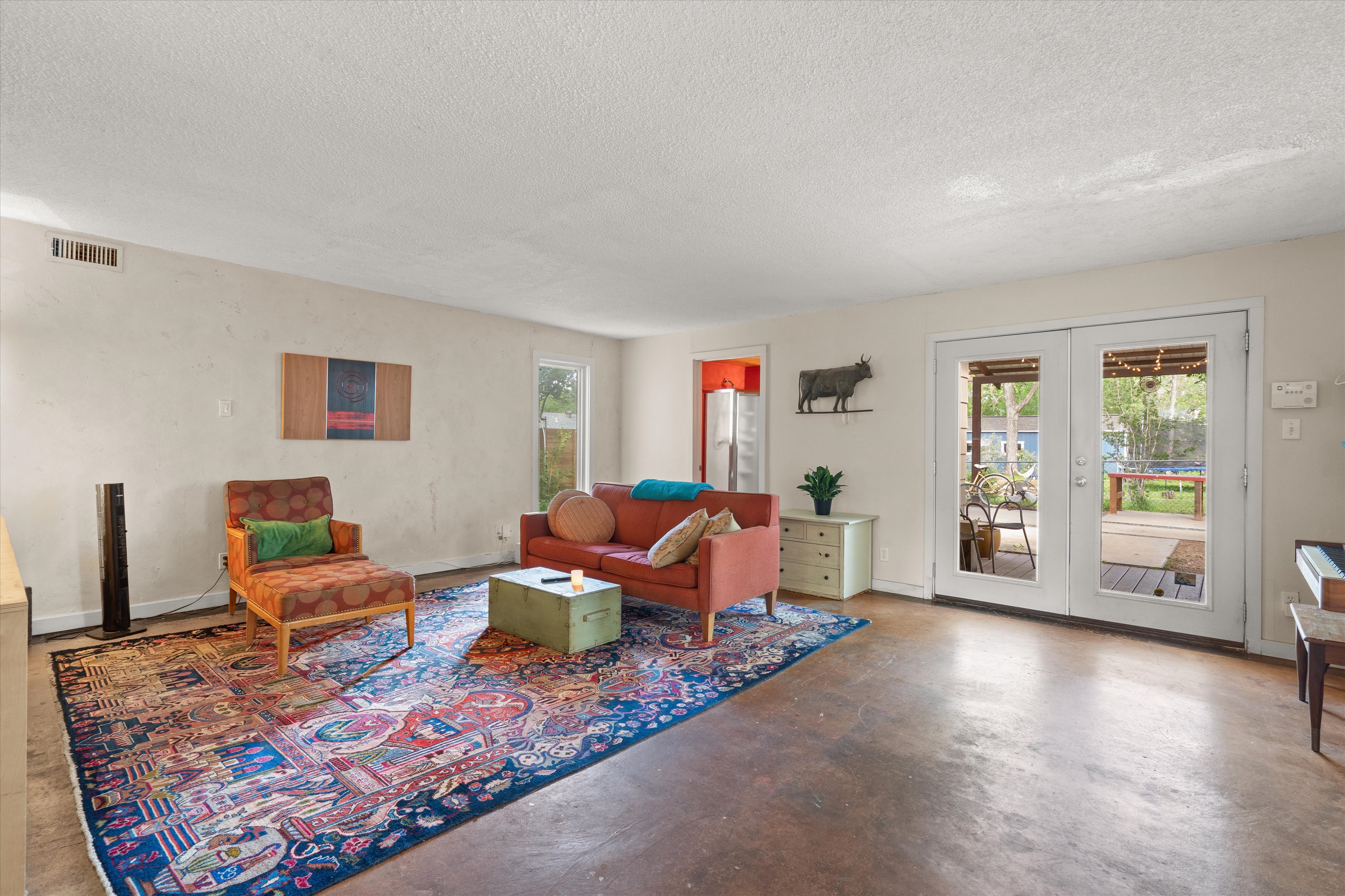 4614 Jinx Avenue Austin, TX 78745 - Photo 20 of 40 a living room with furniture and a window