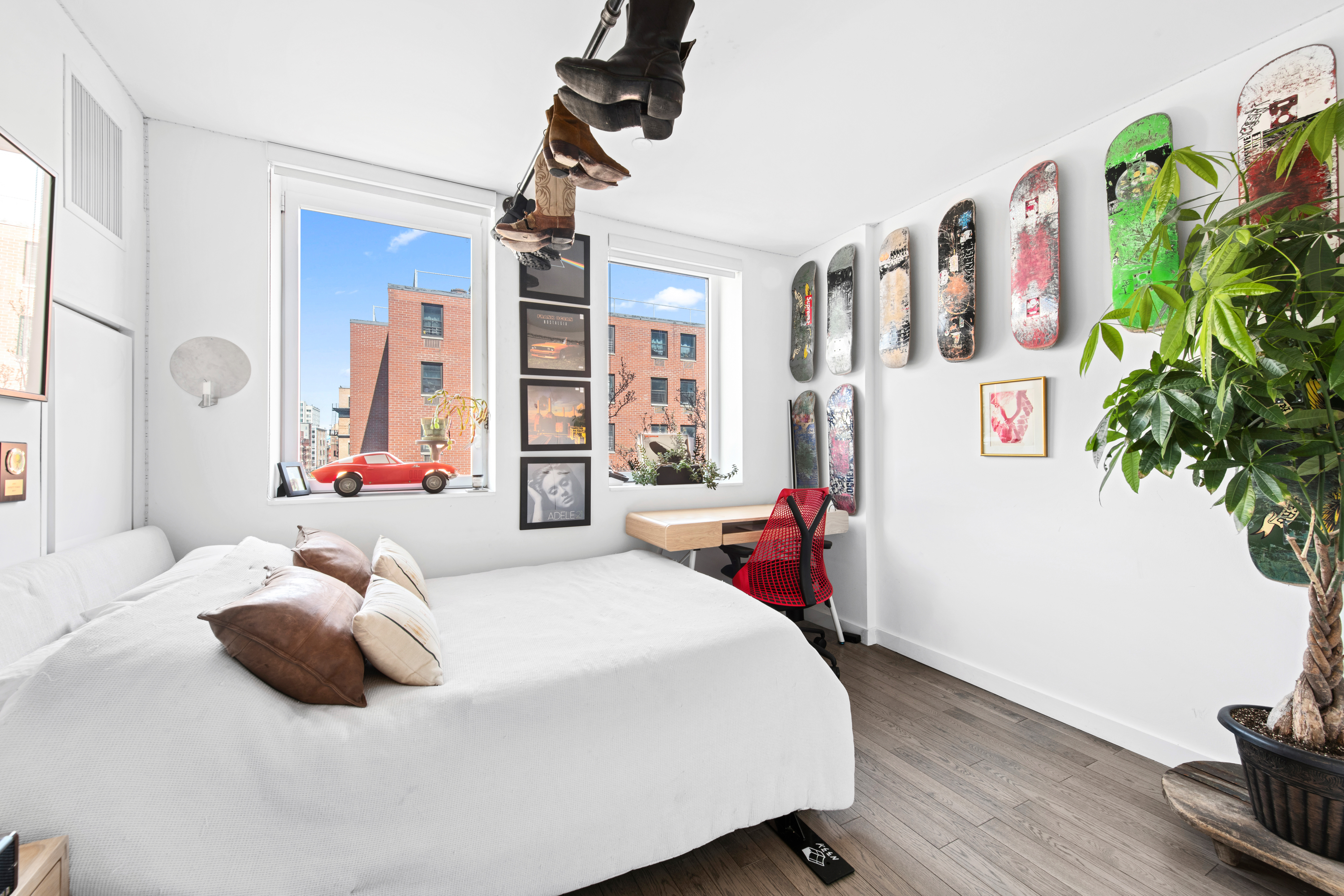 285 West 110th Street, Unit 4B Manhattan, NY 10026 - Photo 7 of 14 a bedroom with a bed dresser and a window