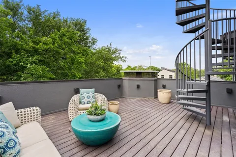 a bedroom with furniture and a chandelier