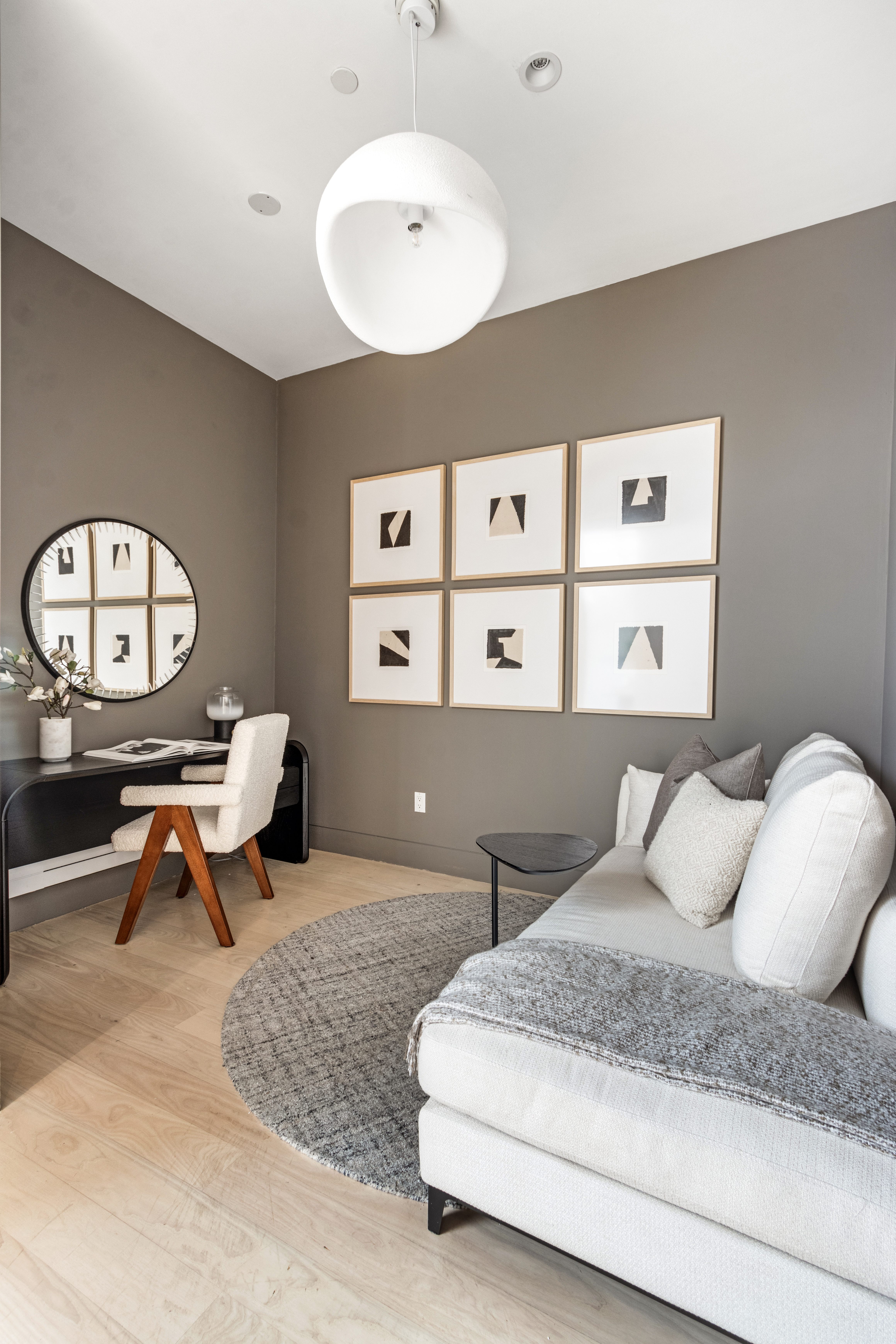 85 Leonard Street, Unit PH Manhattan, NY 10013 - Photo 16 of 27 a living room with furniture and a large mirror