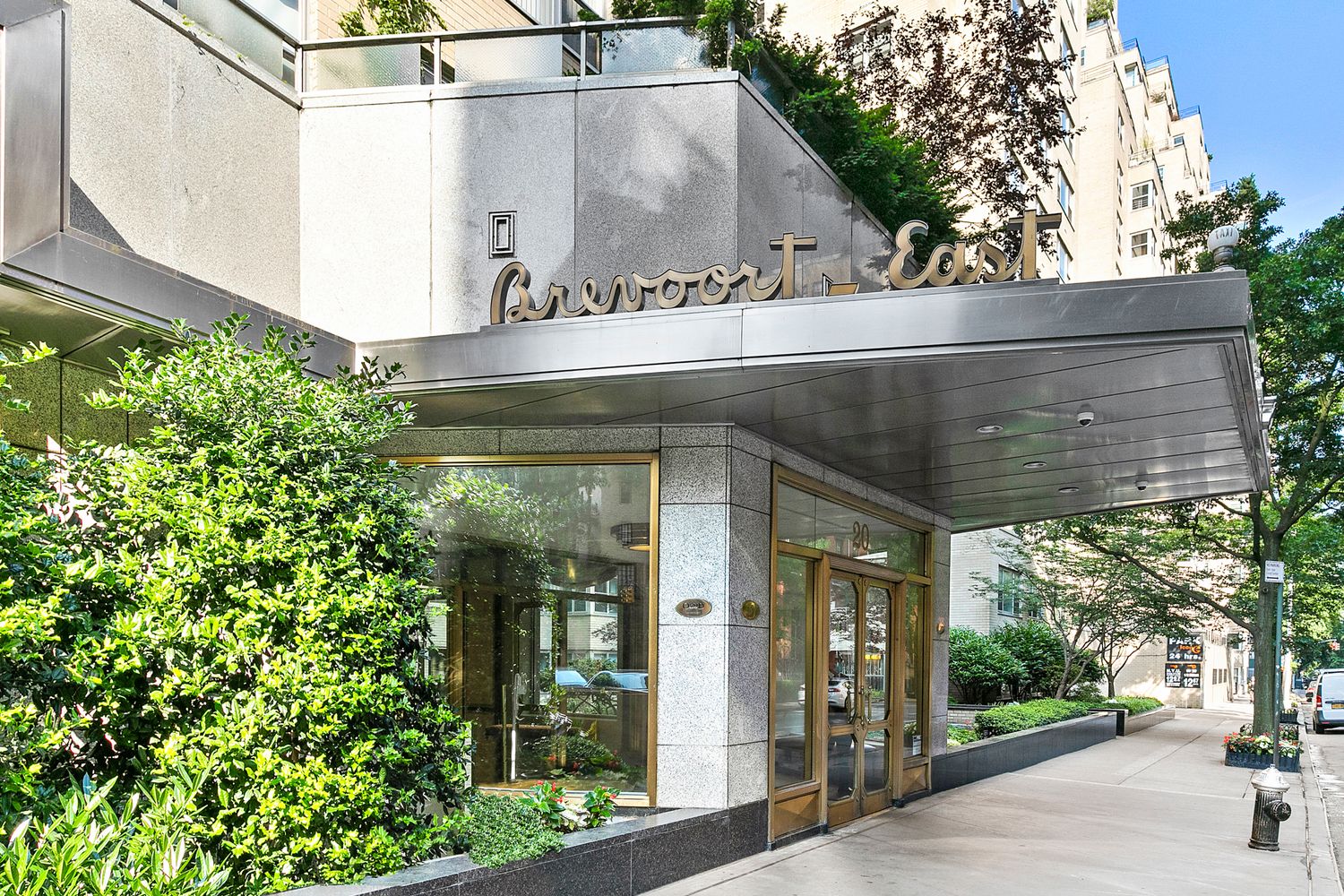 20 East 9th Street, Unit 22C Manhattan, NY 10003 - Photo 12 of 21 a view of a glass door with a tree