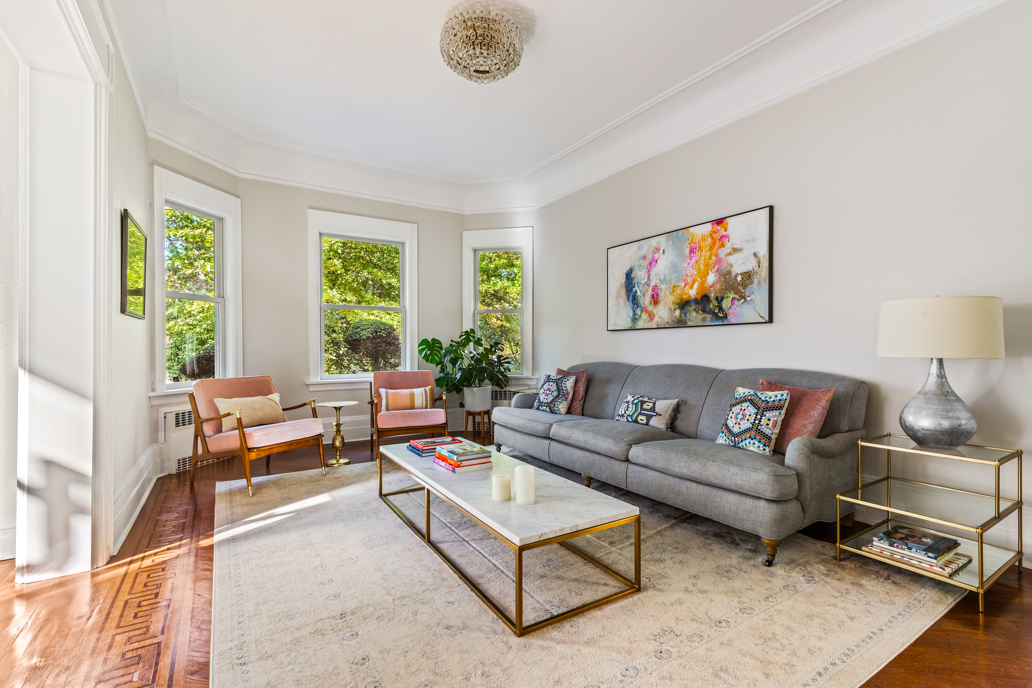 689 East 17th Street Brooklyn, NY 11230 - Photo 3 of 28 a living room with furniture and a large window