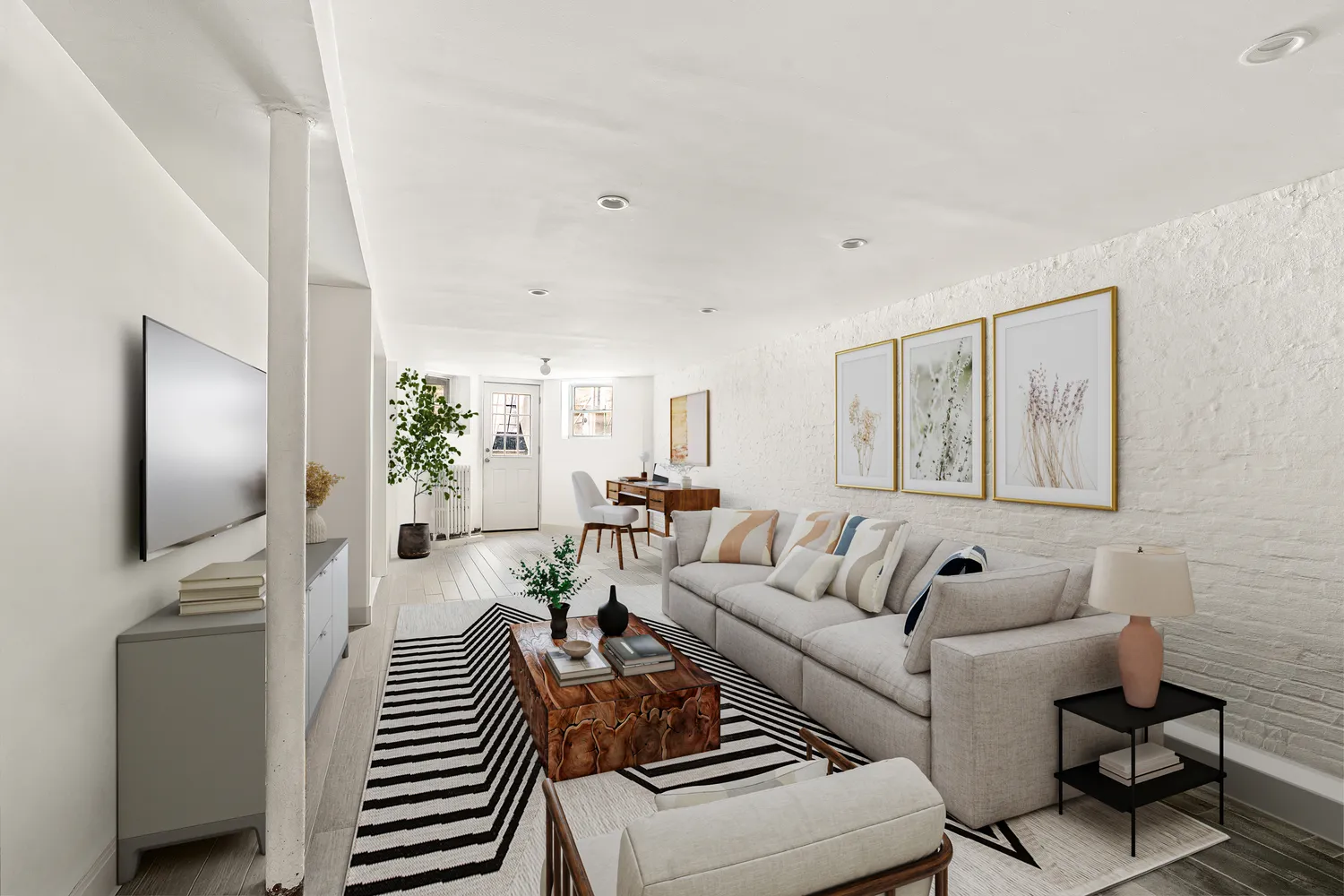 a living room with furniture and a flat screen tv