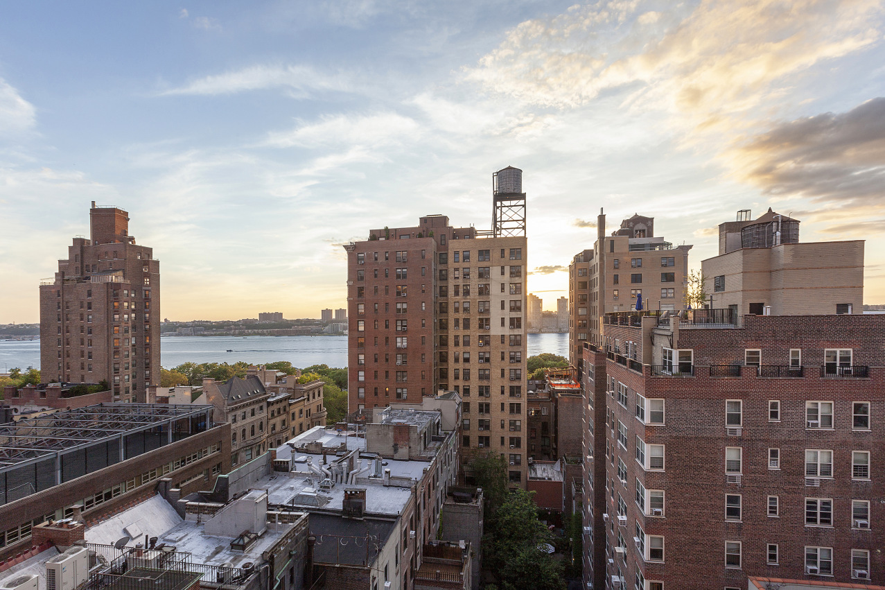 a view of a city with tall buildings