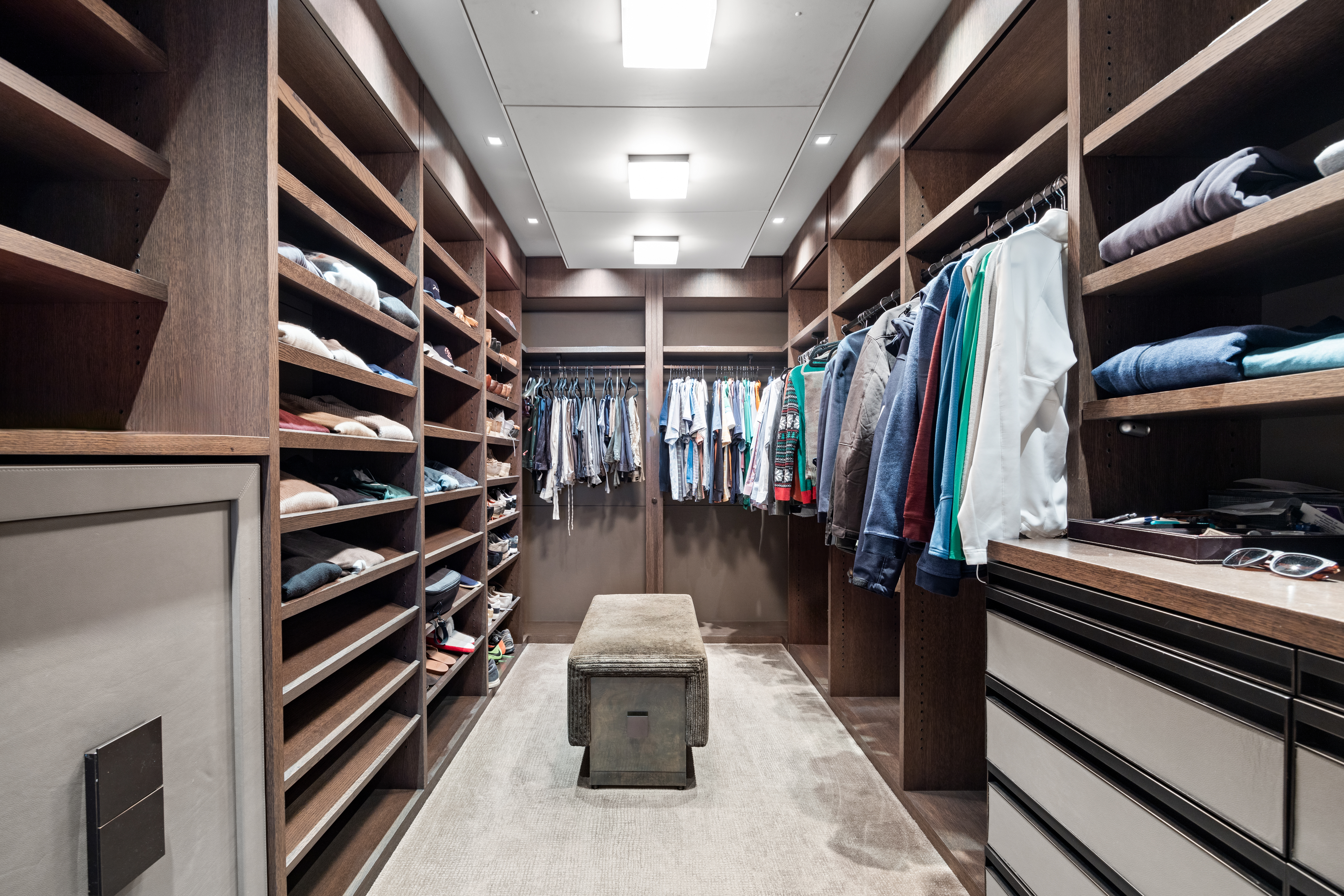 219 East 67th Street, Unit 5 Manhattan, NY 10065 - Photo 11 of 18 a view of walk in closet with clothes and shoes