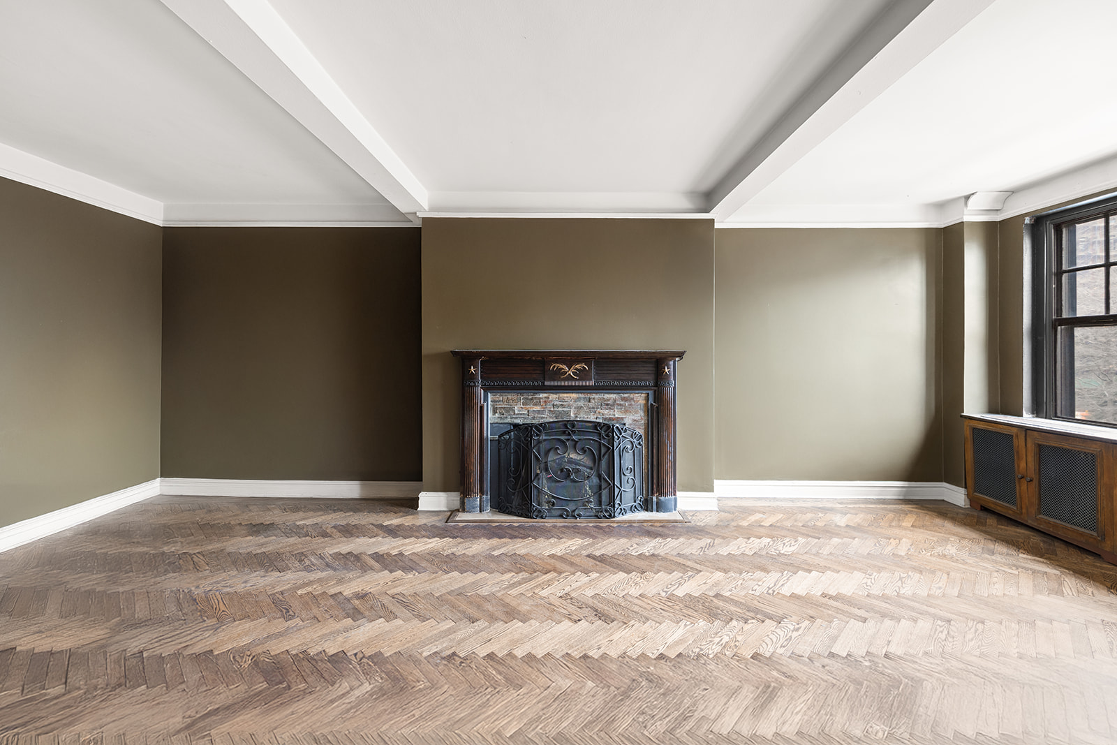 5 Riverside Drive, Unit 3B Manhattan, NY 10023 - Photo 3 of 14 a view of an empty room with window and fireplace