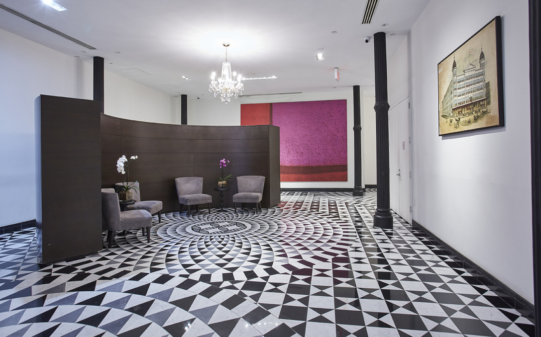 655 6th Avenue, Unit 5H Manhattan, NY 10010 - Photo 13 of 15 a bathroom with a black white checkered floor